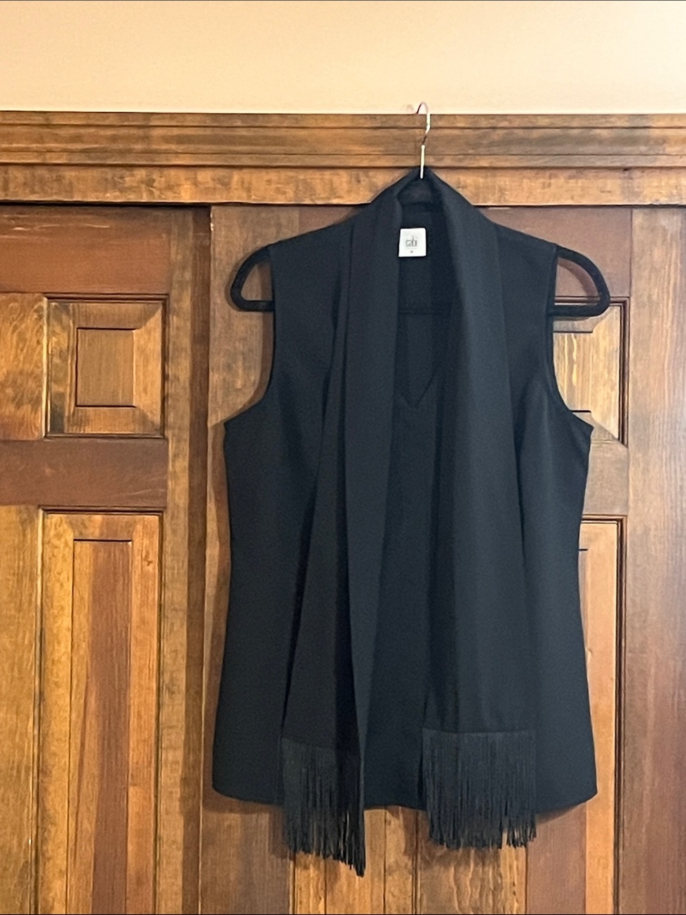 CAbi sleeveless blouse with attached scarf tie with fringe detail